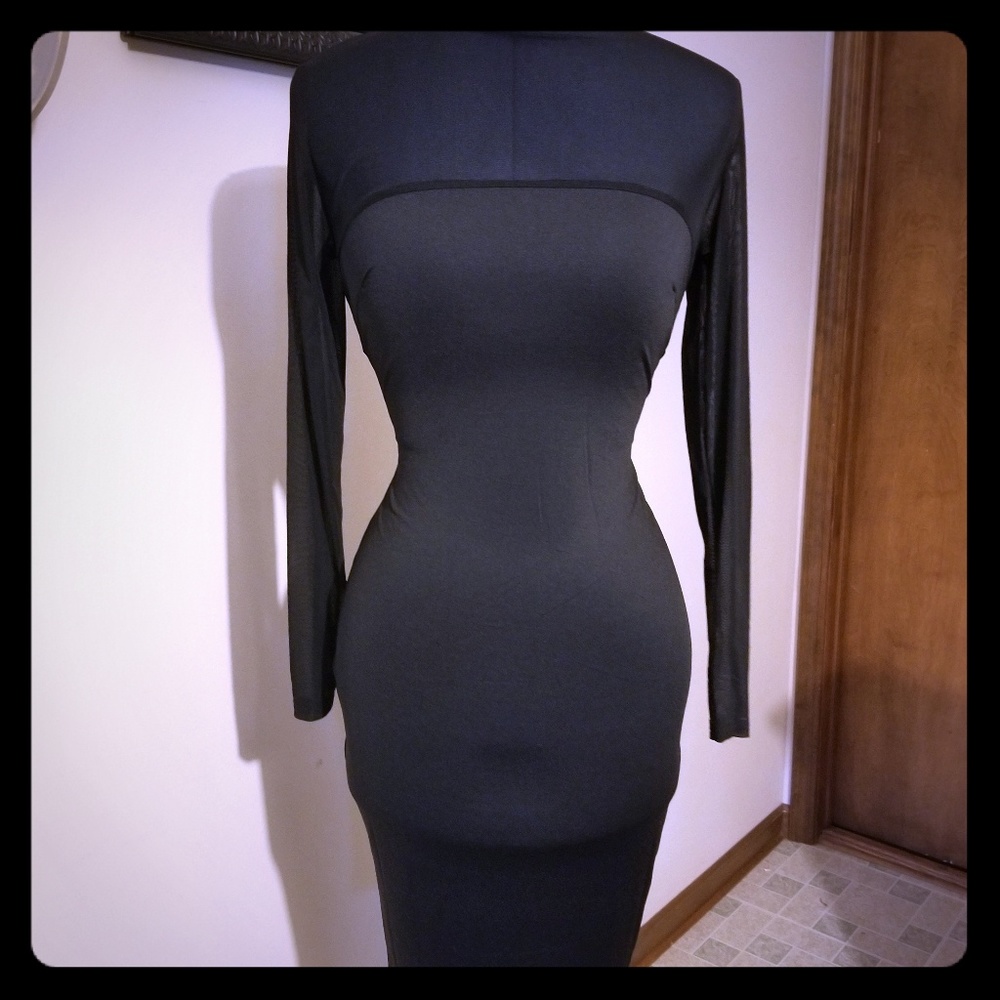 Black bodycon dress with sheer sleeves